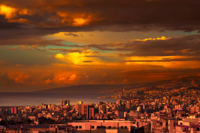 beautiful coastal city on sunset