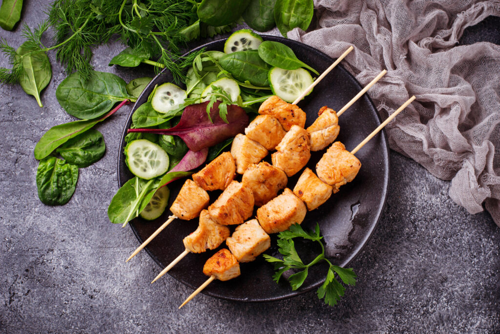 chicken shish kebabs with green salad