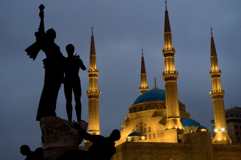 shot of the martyrs monument in front of the mohammad al amin mosque beirut lebanon